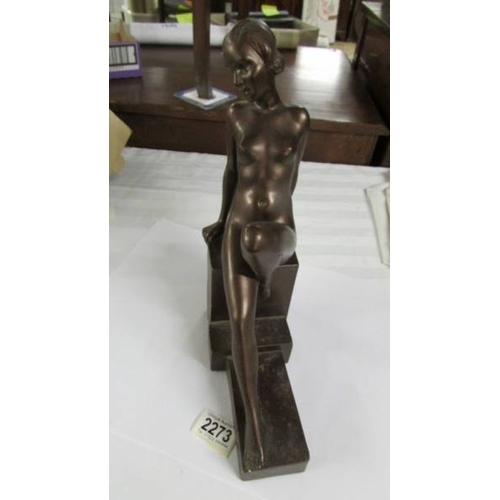 2273 - An art deco seated nude female figure. (RD. 796953).