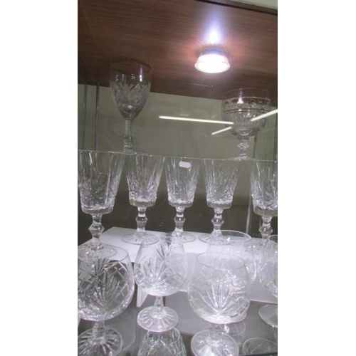 2280 - Approximately 25 cut glass wine and other drinking glasses.