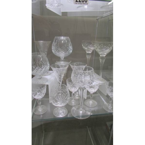 2280 - Approximately 25 cut glass wine and other drinking glasses.