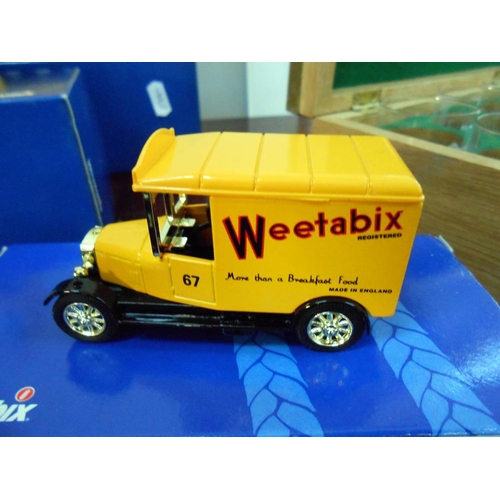 313 - 4 boxed Weetabix Corgi Classic vehicles