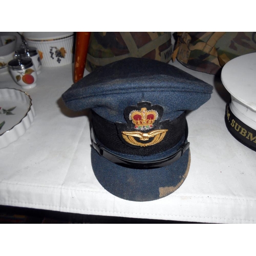 343 - 5 military helmets/caps including No.1 dress RAF officer and H.M. Submariner cap, all need cleaning ... 