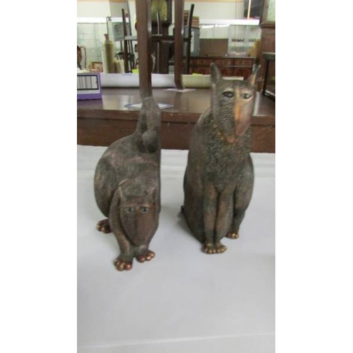 2292 - 4 Marsha McCarthy cats (circa 2003), one pair of bookends and 2 reclining cats.