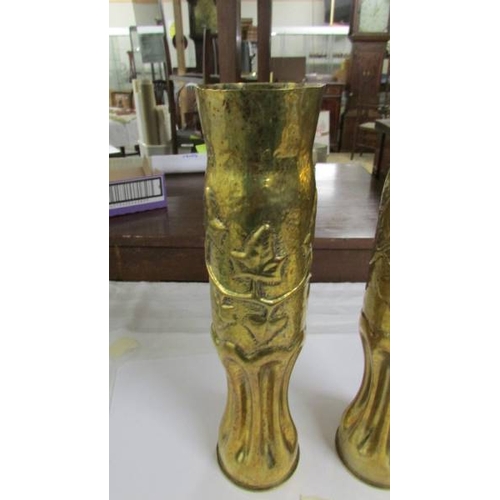 2297 - A pair of WW1 French 75 mm brass shell vases (Trench art) circa 1917.  34 cm  high.