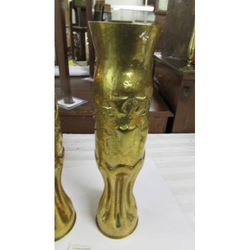 2297 - A pair of WW1 French 75 mm brass shell vases (Trench art) circa 1917.  34 cm  high.