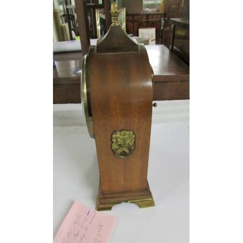 2298 - A 1970's mahogany mantle clock, maid spring is not winding the movement.