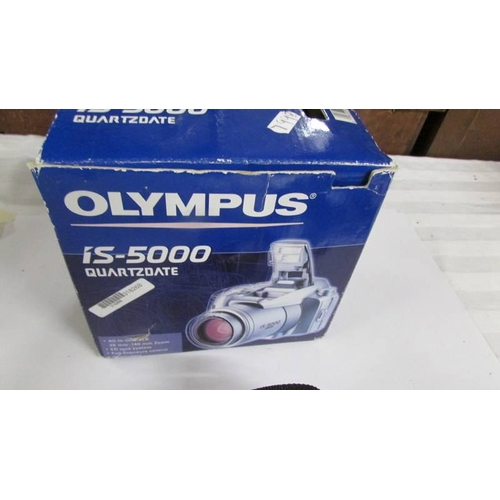 2317 - A boxed Olympus IS-5000 camera.