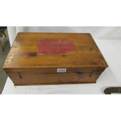 2320 - An early 20th century pine box with brass cup handles containing a large quantity of early 20th cent... 