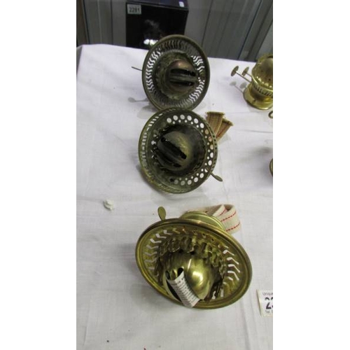 2326 - 6 brass oil lamp burners including 3 with galleries.