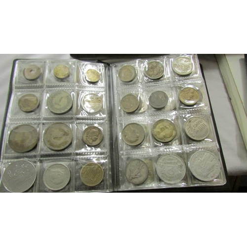 2358 - 5 stock books of world coins.