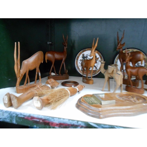 14 - A good selection of treen and carved wooden items including elephant, antelope etc.