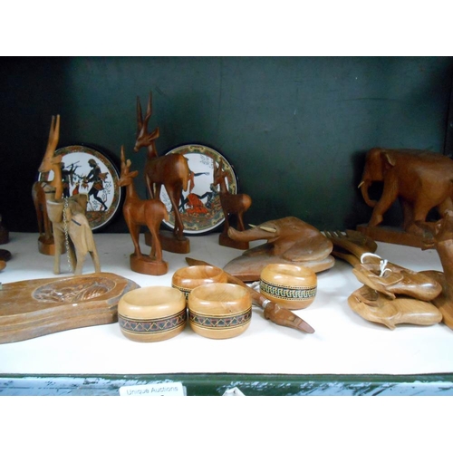 14 - A good selection of treen and carved wooden items including elephant, antelope etc.