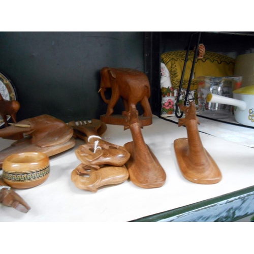 14 - A good selection of treen and carved wooden items including elephant, antelope etc.