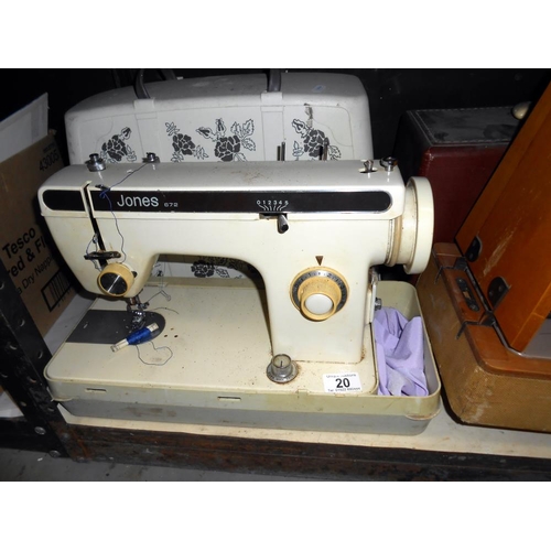 20 - A pair of sewing machines, one being Jones, the other a Singer