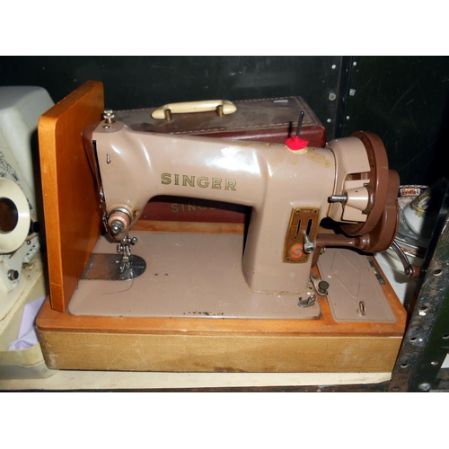 20 - A pair of sewing machines, one being Jones, the other a Singer