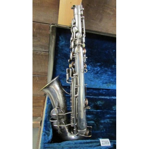 2369 - A 1943 Couesnon Paris Model No.3 Alto saxophone in case.