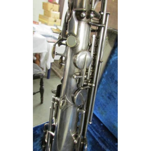 2369 - A 1943 Couesnon Paris Model No.3 Alto saxophone in case.