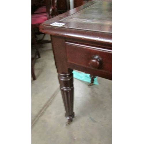 2391 - A 2 drawer mahogany writing table by Edwards and Roberts