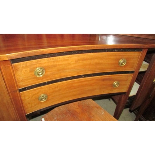 2400 - A Regency style mahogany inlaid sideboard.