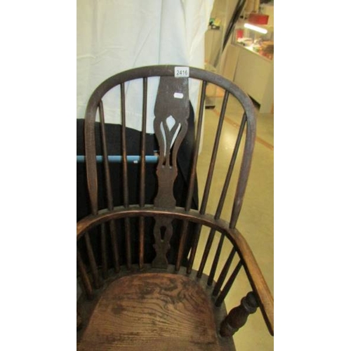 2416 - A 19th century Windsor chair.