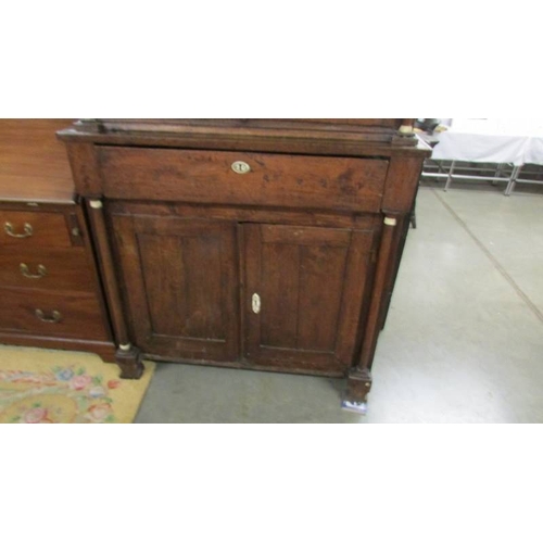 2435 - An early 19th century primitive oak dresser with bone embellishments.