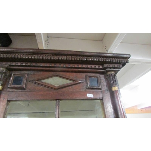 2435 - An early 19th century primitive oak dresser with bone embellishments.