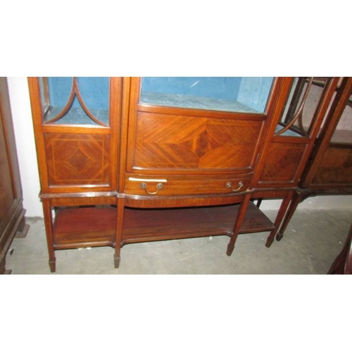 2448 - A good quality Edwardian mahogany display cabinet with domed middle door and astragal glazed side do... 