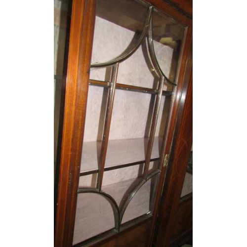 2449 - An Edwardian mahogany inlaid display cabinet.