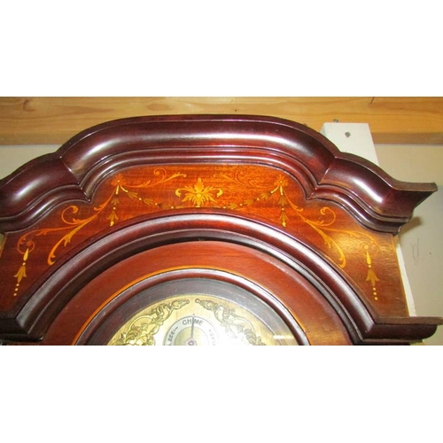 2452 - A mahogany cased 8 day brass dial Grandfather clock with inlaid door and base.