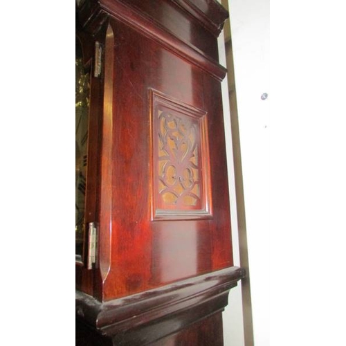 2452 - A mahogany cased 8 day brass dial Grandfather clock with inlaid door and base.