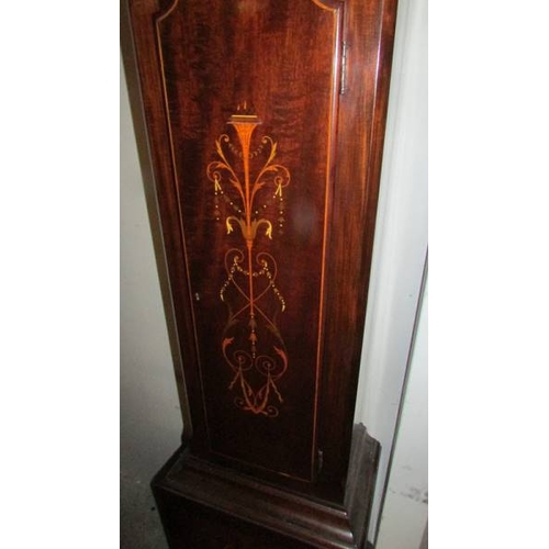 2452 - A mahogany cased 8 day brass dial Grandfather clock with inlaid door and base.