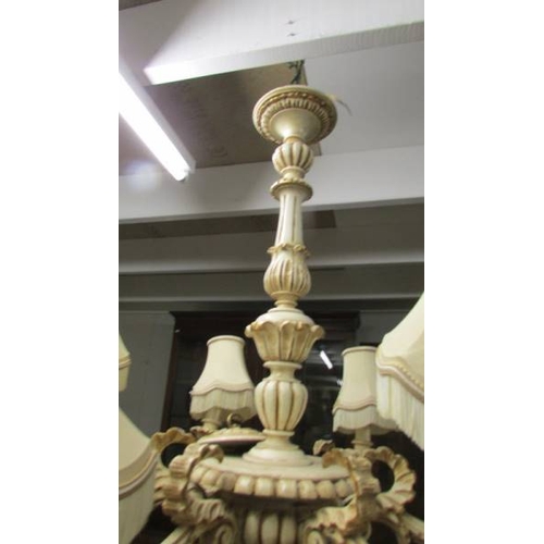 2459 - A large 6 arm wooden chandelier complete with ceiling rose, 71 cm diameter x 80 cm deep.