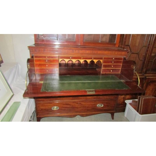 2469 - An Early Victorian Secretaire Bookcase with string inlay,  excellent interior.  (some veneer missing... 