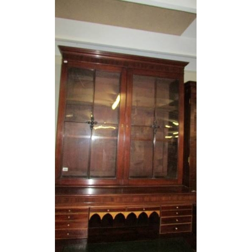 2469 - An Early Victorian Secretaire Bookcase with string inlay,  excellent interior.  (some veneer missing... 