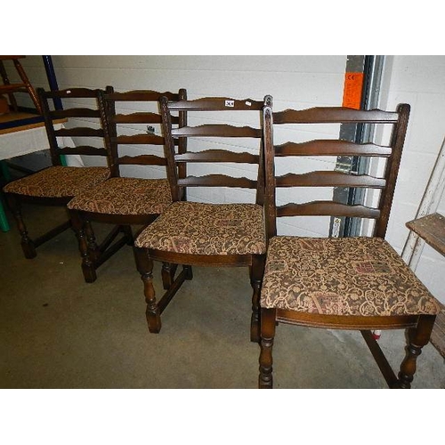 2494 - A set of 4 ladder back chairs with upholstered seats.