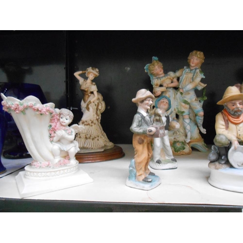 32 - A large Victorian bisque figure group a/f, and a good lot of other figures, toymaker has slight chip... 