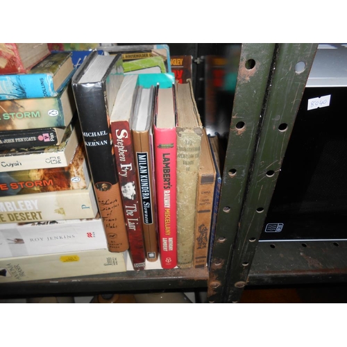 42 - A shelf full of books on many subjects (annuals, novels & natural history)