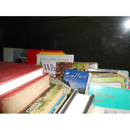 42 - A shelf full of books on many subjects (annuals, novels & natural history)