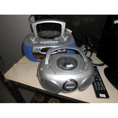 6 - A small tv, monitor and 2 cd radios