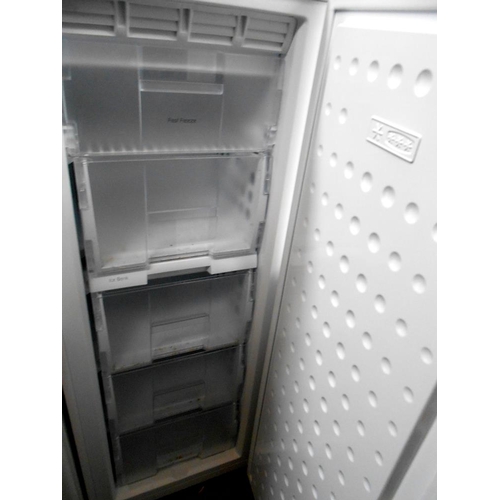 65 - A tall Beko freezer, frost free, fast freeze