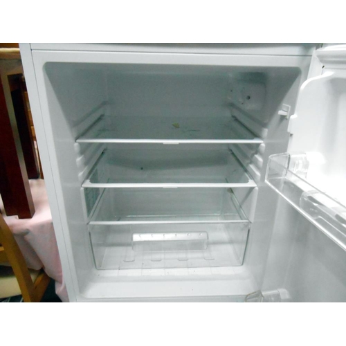 71 - A tall fridge freezer (maker unknown)