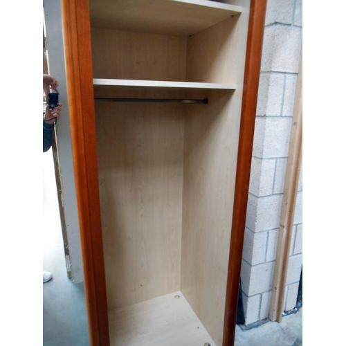 72 - A large teak effect wardrobe with 2 mirrored doors and adjustable shelves, height 216cm, width 170cm... 