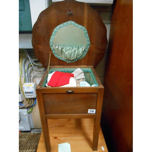 74 - A 1950's sewing work table and contents