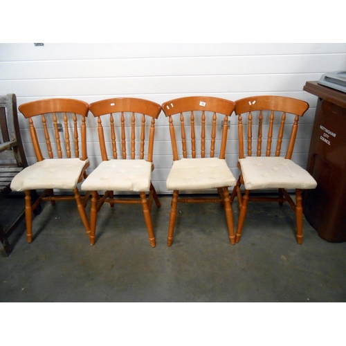 79 - A set of 4 pine kitchen chairs, 1 seat has slight split