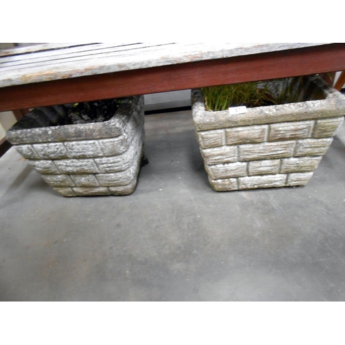 81 - A pair of cement garden planters