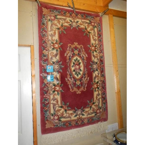 2482 - A 100% wool Chinese carpet in good condition, 152 x 91cm.