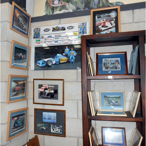 102 - A good selection of framed and glazed formula 1 motor racing prints and photographs, including Nigel... 