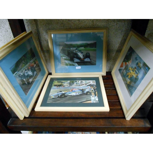 102 - A good selection of framed and glazed formula 1 motor racing prints and photographs, including Nigel... 