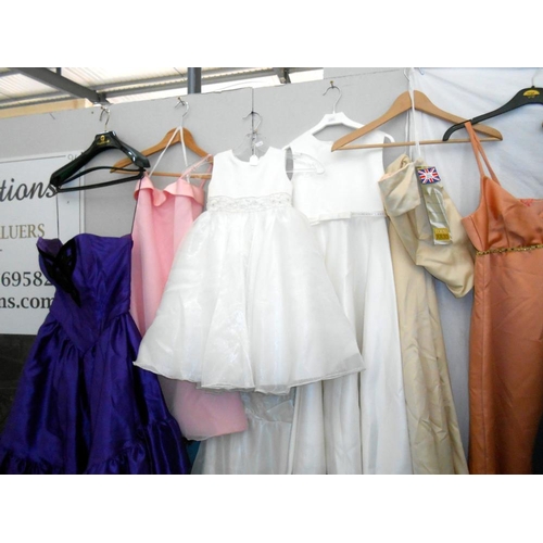 117 - A good lot of bridesmaids/prom dresses various sizes and colours, mostly 10/12, including some child... 