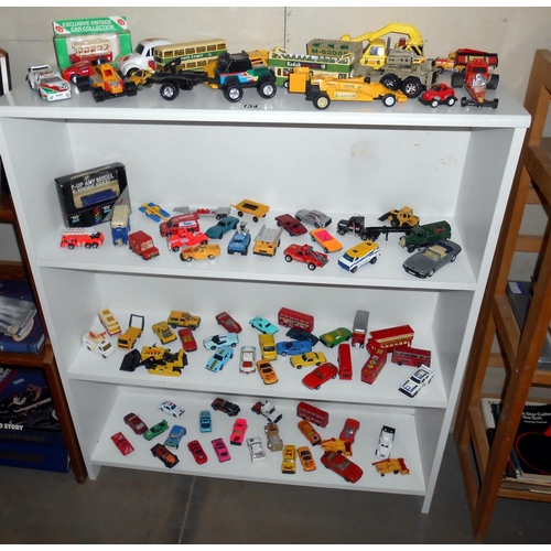 134 - 4 shelves of mixed diecast including Corgi, Matchbox, Hot Wheels etc.