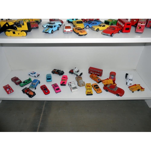 134 - 4 shelves of mixed diecast including Corgi, Matchbox, Hot Wheels etc.